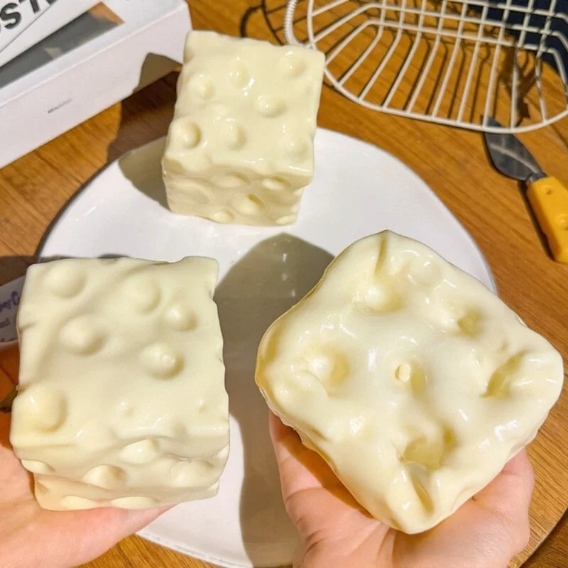 Novelty Gifts - Taba Squishy Cheese Cube, Pelota Antiestrés